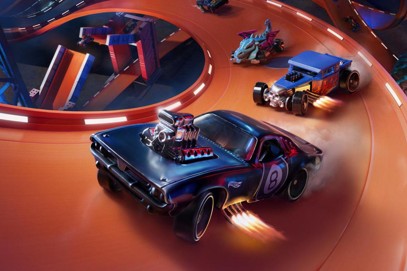 Image promotionnelle du jeu Hot Wheels Unleashed montrant des voitures faisant la course sur un parcours en plastique orange