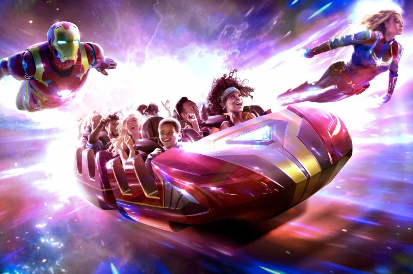 Promotional image of the Avengers Assemble Flight Force attraction showing the wagon, Iron Man and Captain Marvel